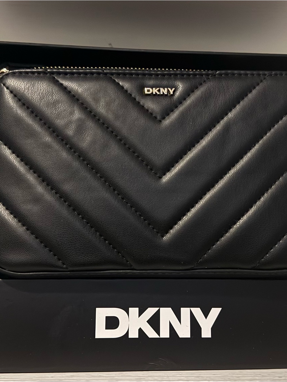 DKNY Black Quilted Chevron Leather Zip Wallet with Gold Logo